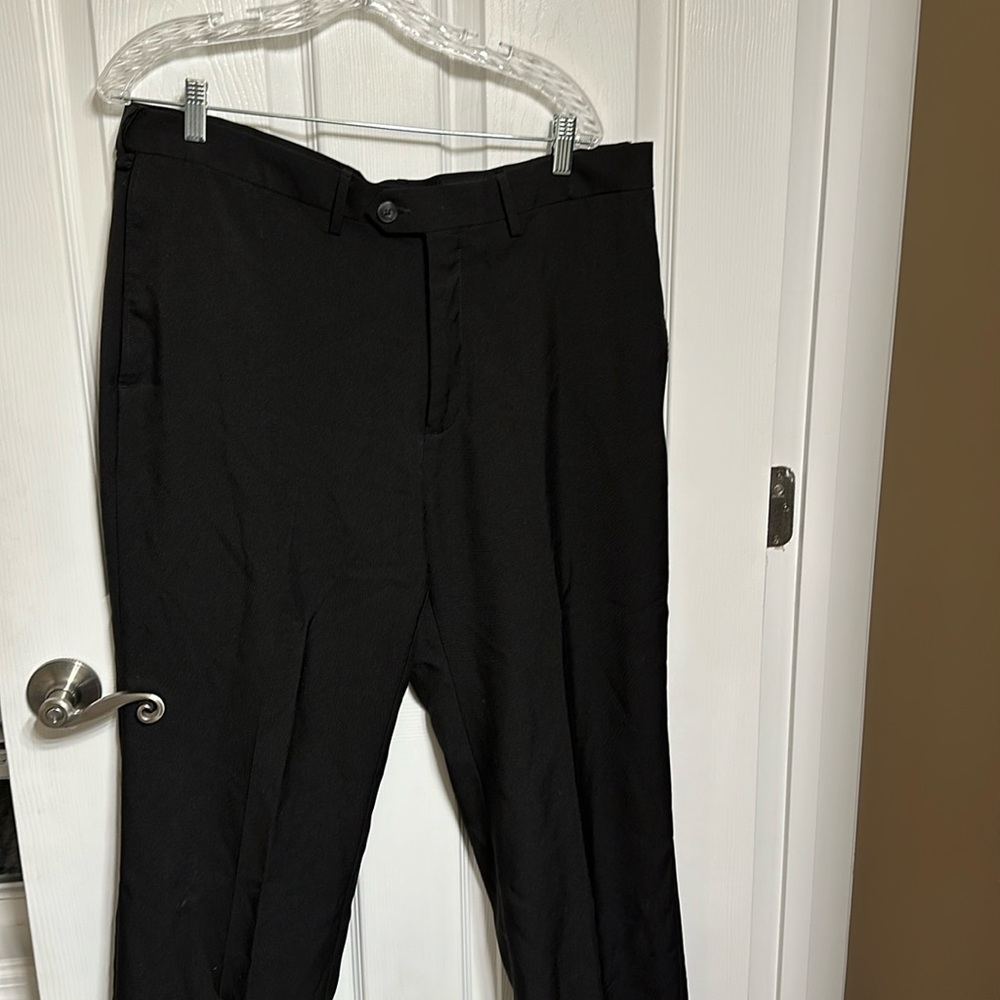 Black Haggar dress pants. 38x30 with expanding waistband.